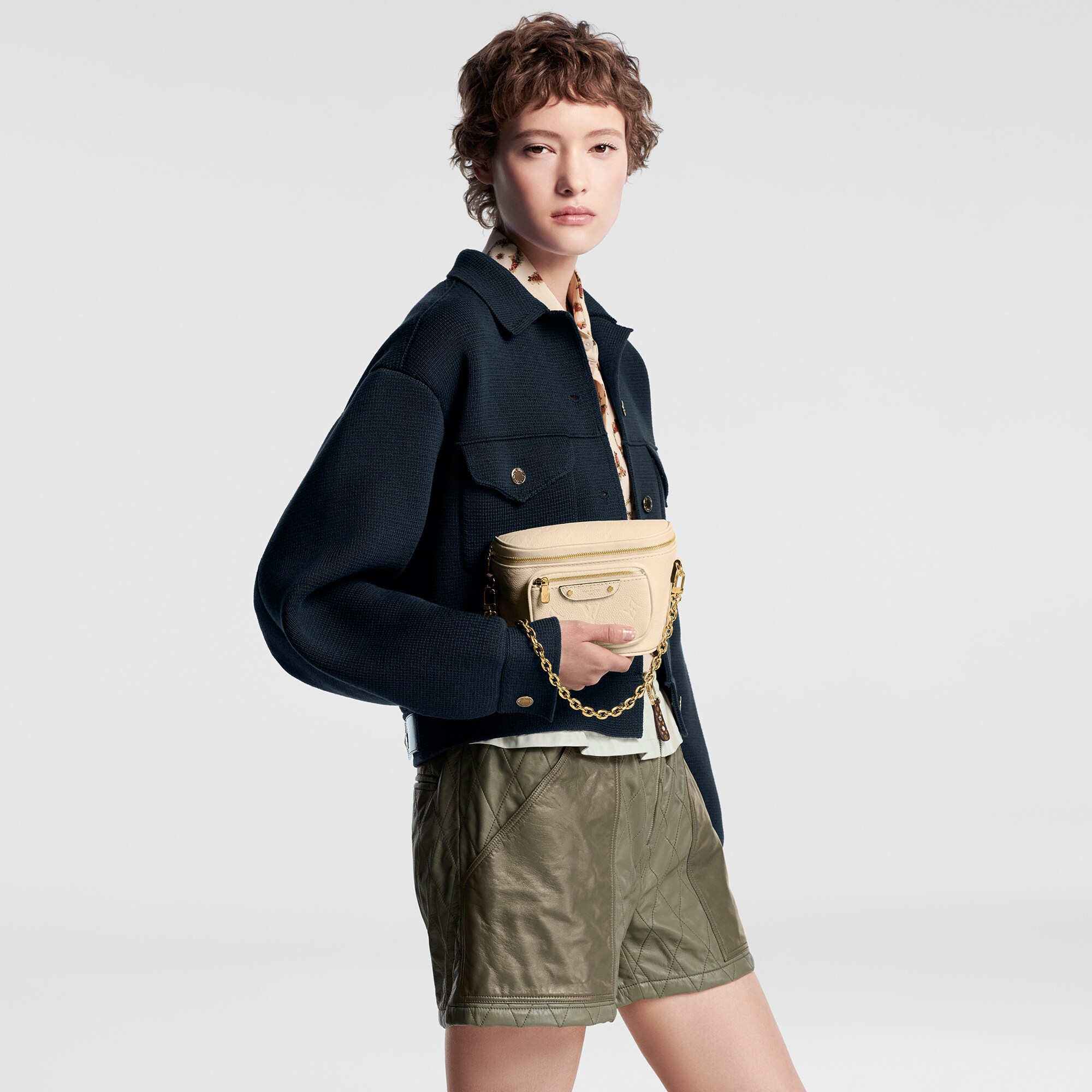 Monogram Empreinte Bolsas de mano Todas las bolsas de mano Bolsa cangurera Mini | Louis Vuitton ® (Ampliar producto)