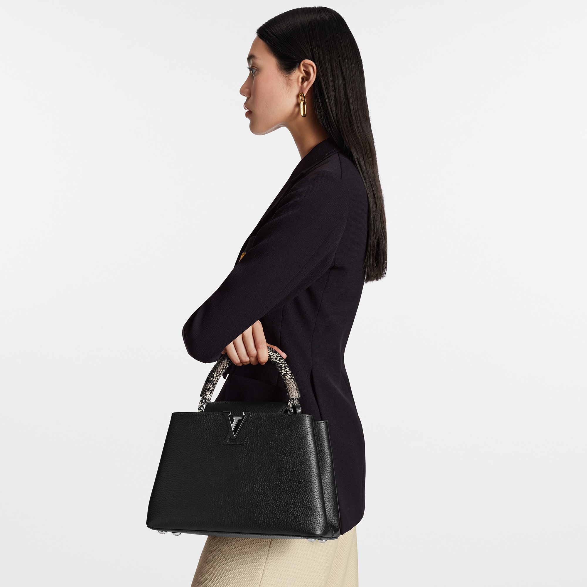 Python Bolsas de mano Todas las colecciones Bolsa Capucines PM | Louis Vuitton ® (Ampliar producto)