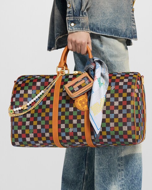 Damier Ebene Bolsas para Hombre LV Icons Bolsa de viaje Keepall 50 con correa | Louis Vuitton ®