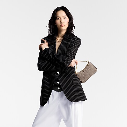 Monogram Empreinte Carteras y artículos de piel pequeños Todas las carteras y artículos de piel pequeños Bolsa Easy Pouch On Strap | Louis Vuitton ® (Ampliar producto)