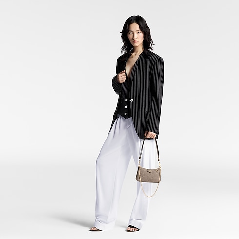 Monogram Empreinte Carteras y artículos de piel pequeños Todas las carteras y artículos de piel pequeños Bolsa Easy Pouch On Strap | Louis Vuitton ® (Ampliar producto)