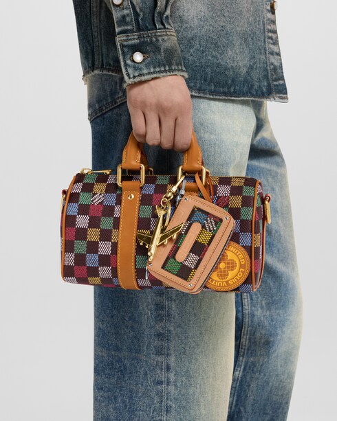 Damier Ebene Canvas Bolsas para Hombre LV Icons Bolsa Keepall 25 con correa | Louis Vuitton ®