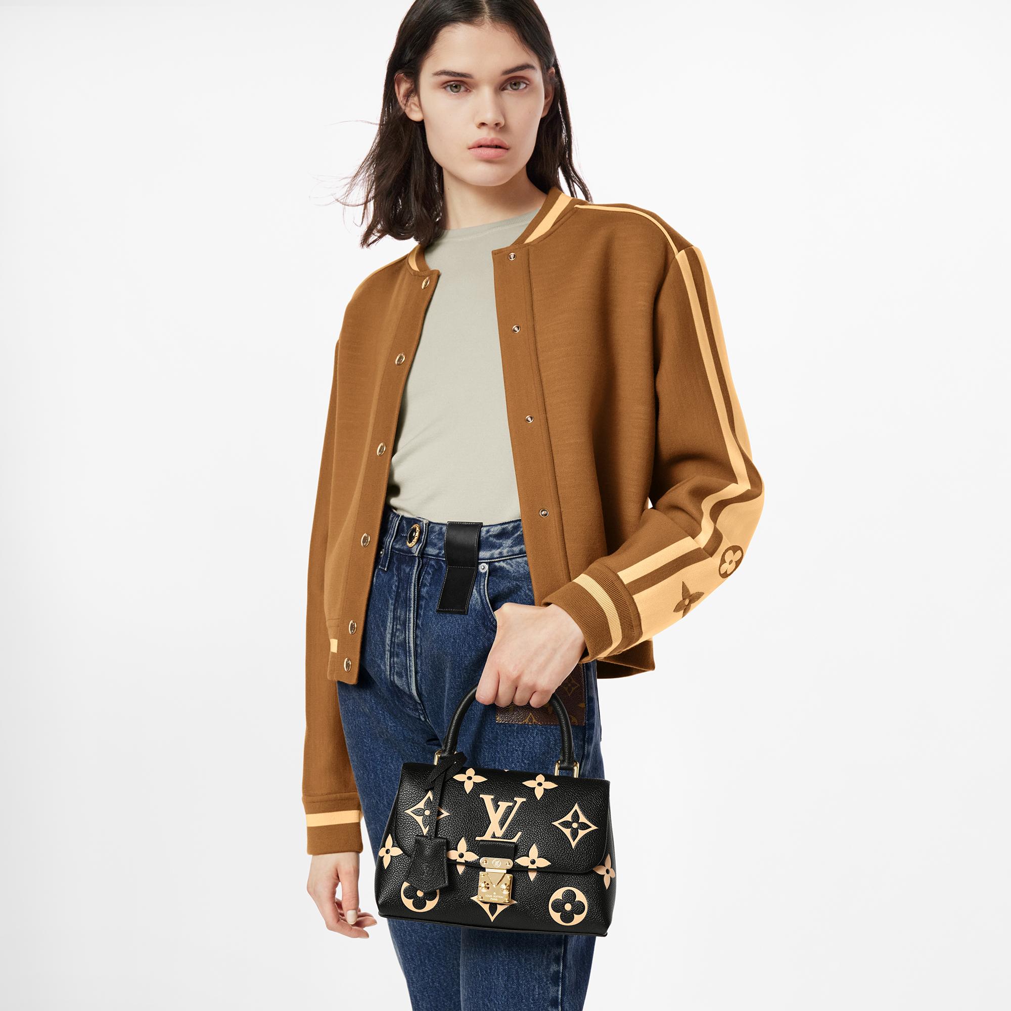 Bicolor Monogram Empreinte Leather Bolsas de mano Todas las bolsas de mano Bolsa Madeleine BB | Louis Vuitton ® (Ampliar producto)