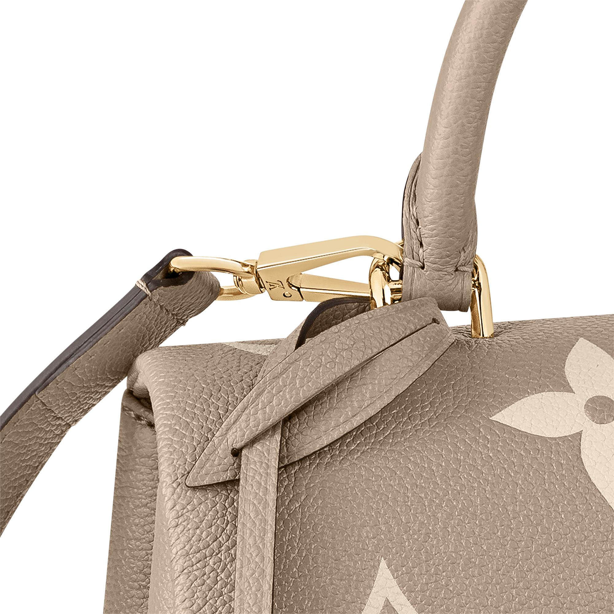 Bicolor Monogram Empreinte Leather Bolsas de mano Todas las bolsas de mano Bolsa Madeleine MM | Louis Vuitton ® (Ampliar producto)