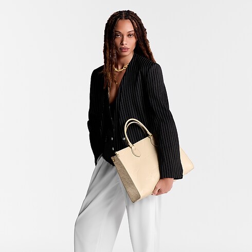 Monogram Empreinte Bolsas de mano Todas las colecciones Bolsa OnTheGo MM | Louis Vuitton ® (Ampliar producto)