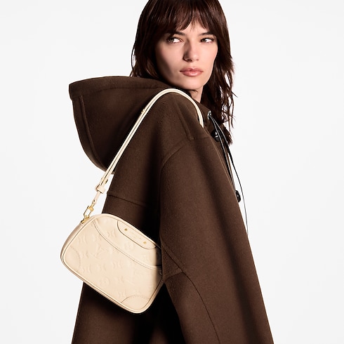 Monogram Empreinte Carteras y artículos de piel pequeños Carteras con cadena y Micro Bolsas Bolsa Tiny Camera Bag | Louis Vuitton ® (Ampliar producto)