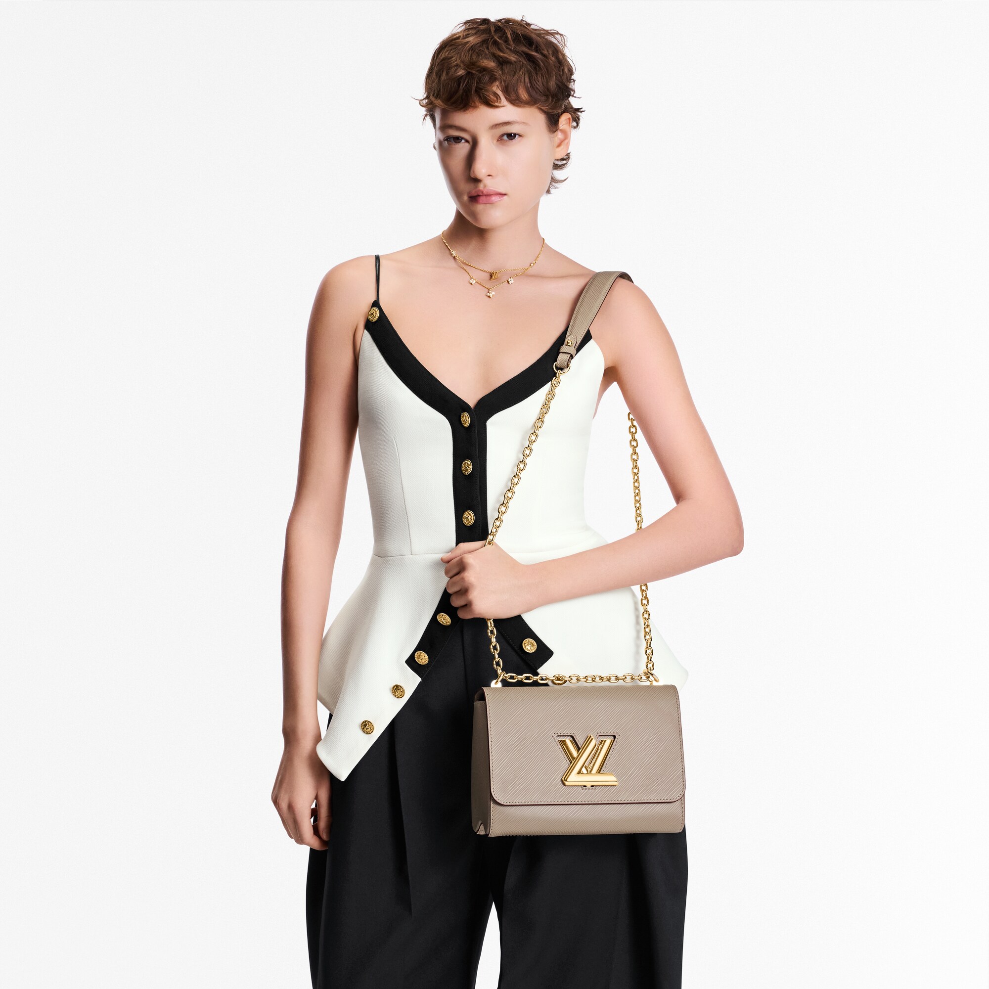 Epi Bolsas de mano Todas las bolsas de mano Bolsa Twist MM | Louis Vuitton ® (Ampliar producto)