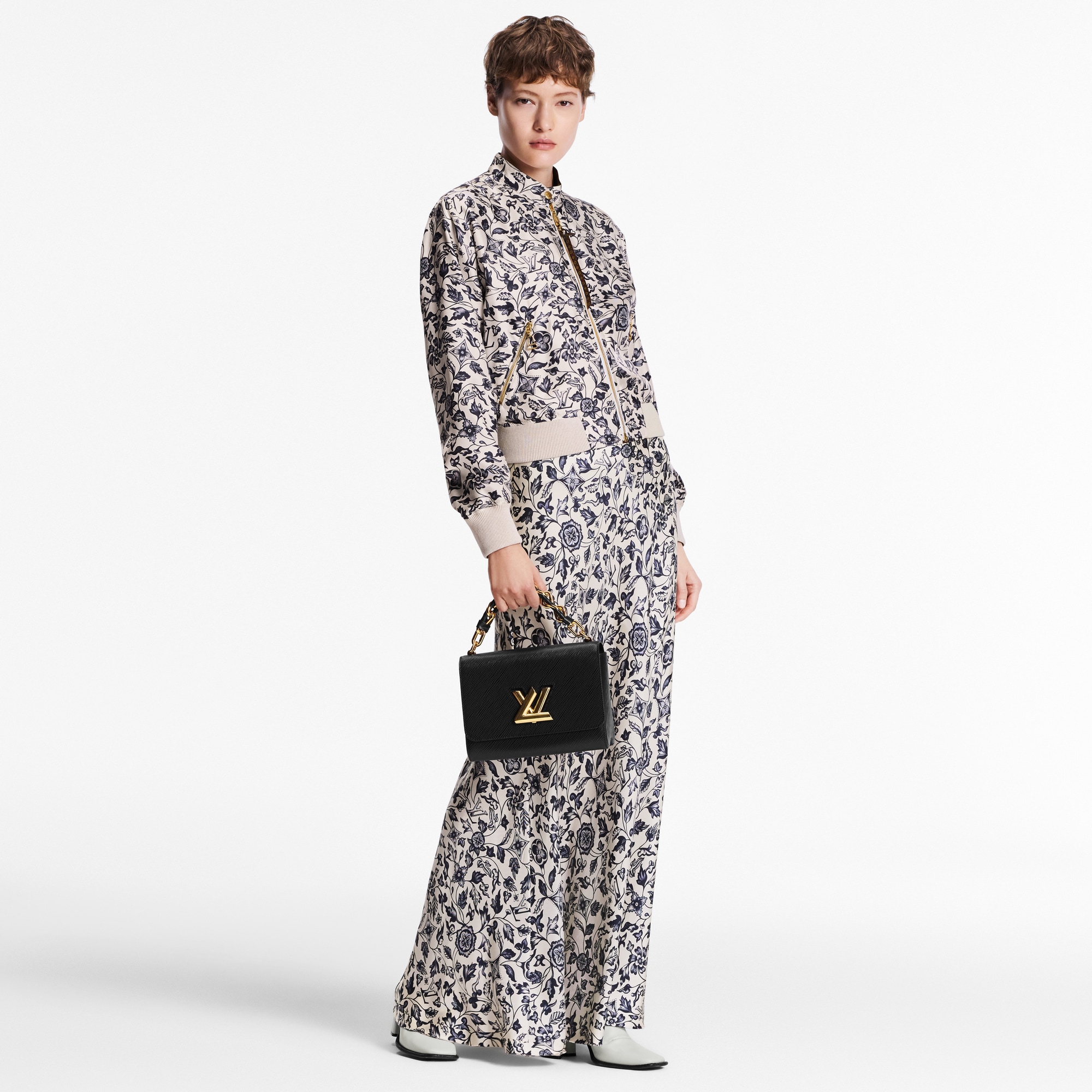 Epi Bolsas de mano Todas las bolsas de mano Bolsa Twist MM | Louis Vuitton ® (Ampliar producto)