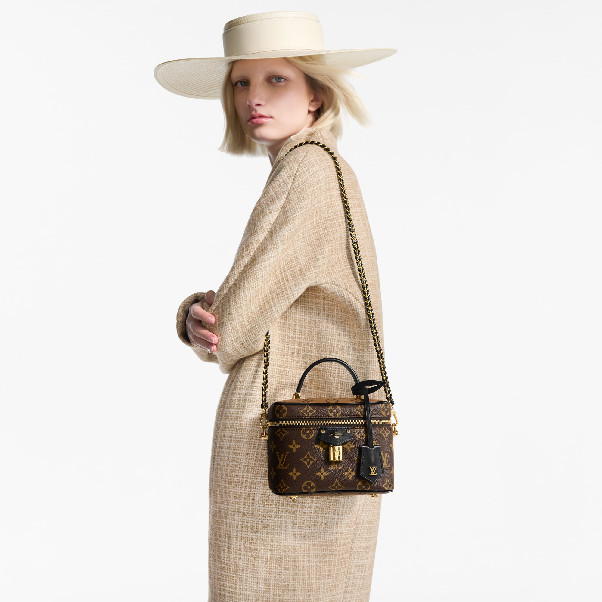 Canvas Monogram Reverse Bolsas de mano Todas las bolsas de mano Bolsa Vanity PM | Louis Vuitton ® (Ampliar producto)