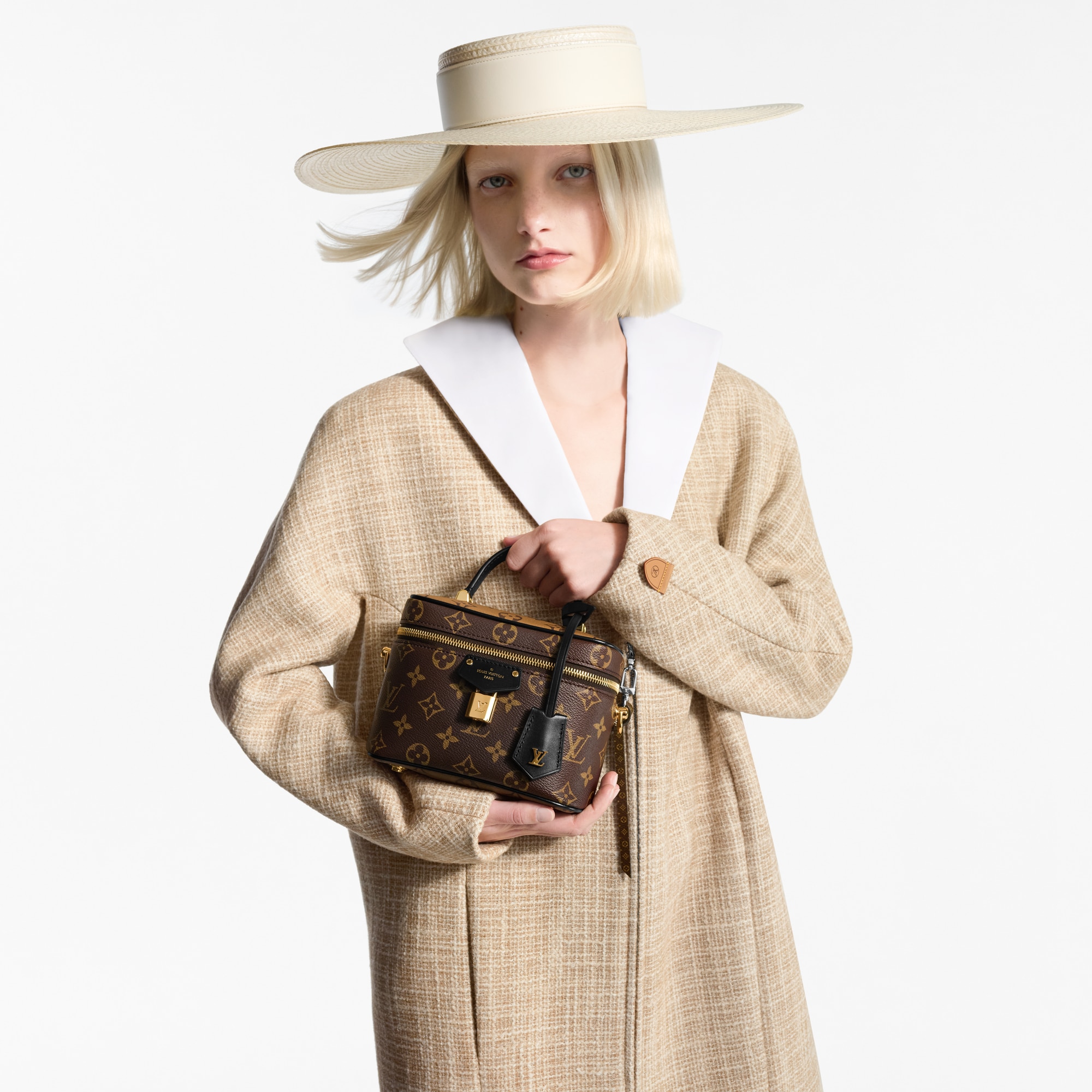 Canvas Monogram Reverse Bolsas de mano Todas las bolsas de mano Bolsa Vanity PM | Louis Vuitton ® (Ampliar producto)
