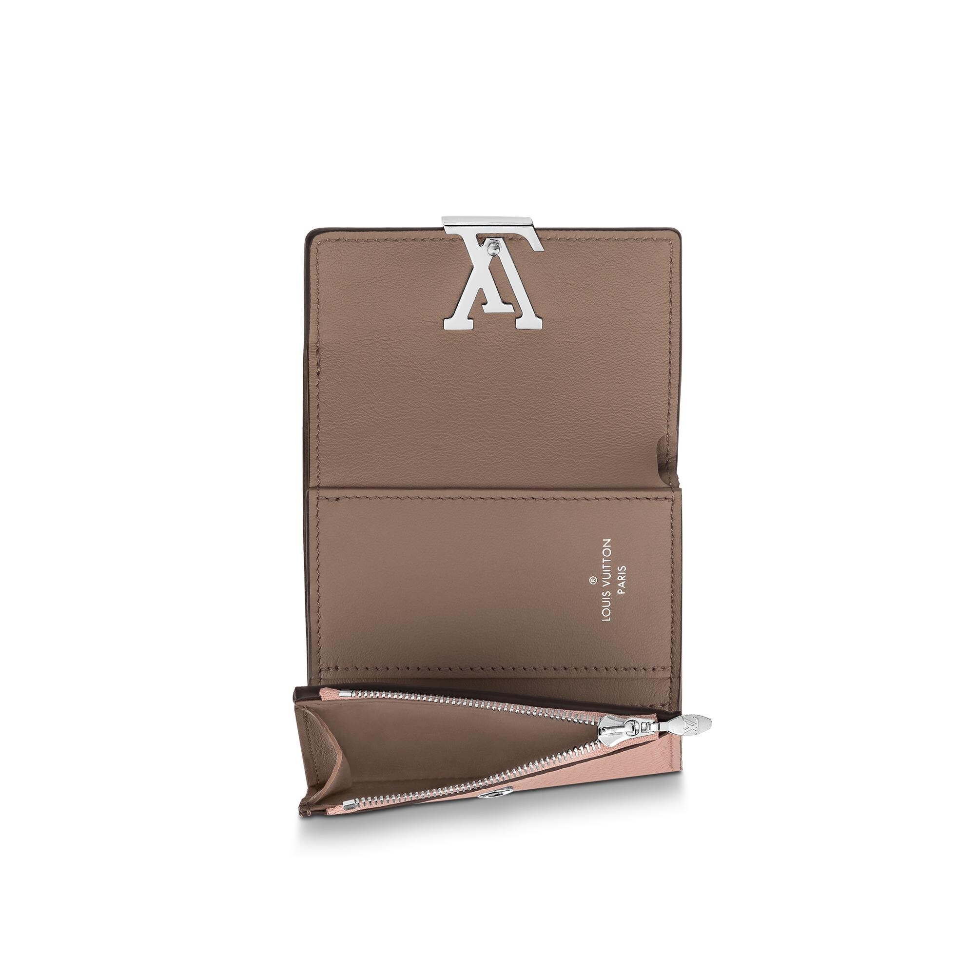 Capucines Carteras y artículos de piel pequeños Todas las carteras y artículos de piel pequeños Cartera Capucines XS | Louis Vuitton ® (Ampliar producto)