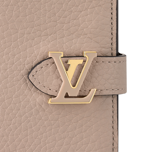 Capucines Carteras y artículos de piel pequeños Carteras compactas Cartera compacta LV Vertical | Louis Vuitton ® (Ampliar producto)
