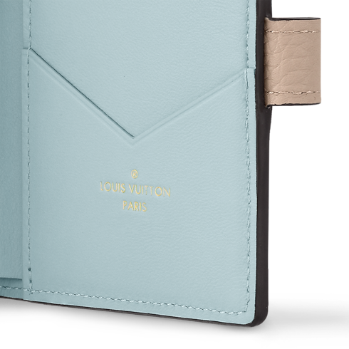 Capucines Carteras y artículos de piel pequeños Carteras compactas Cartera compacta LV Vertical | Louis Vuitton ® (Ampliar producto)