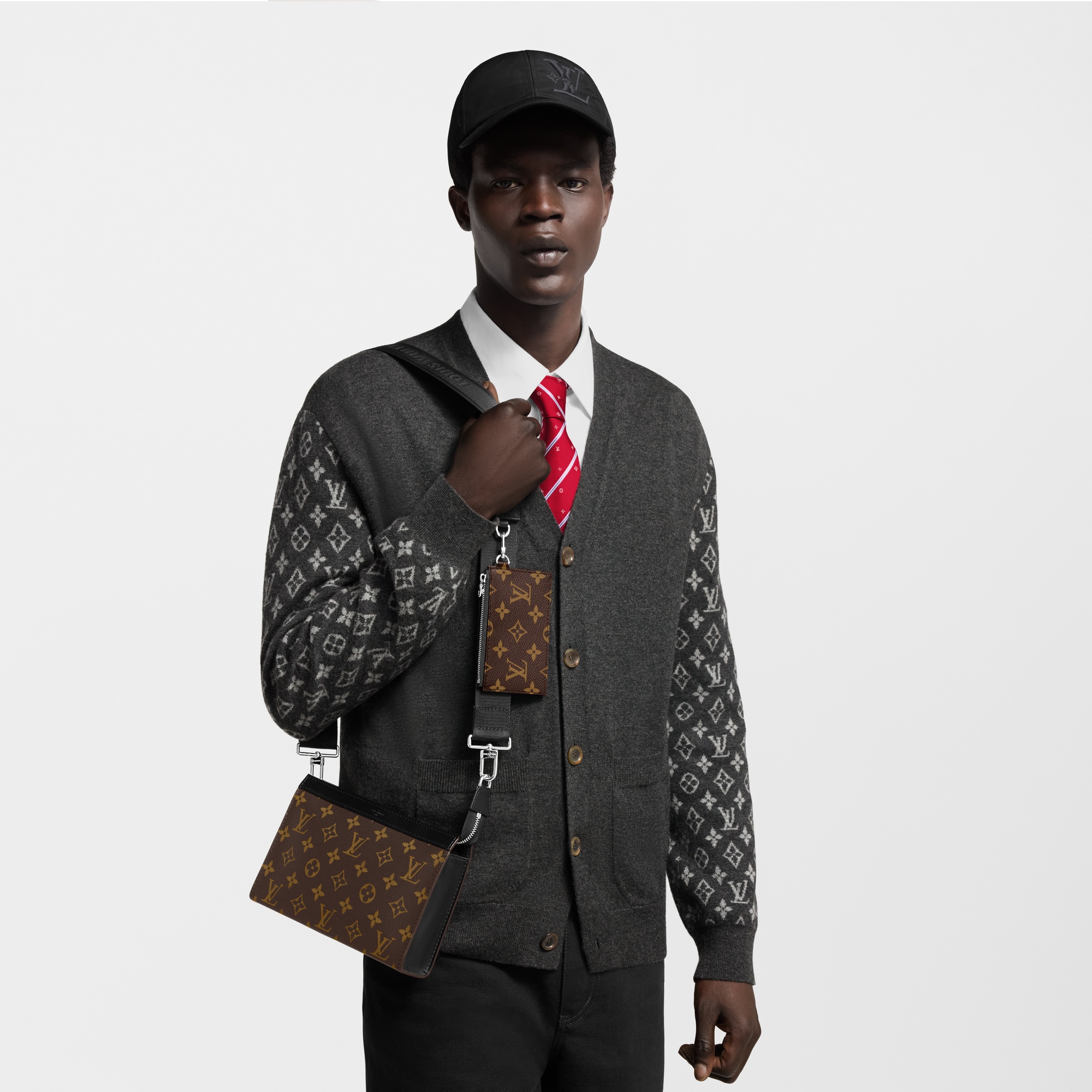 Monogram Macassar Carteras y artículos de piel pequeños Bolsas pequeñas Cartera Gaston con correa | Louis Vuitton ® (Ampliar producto)