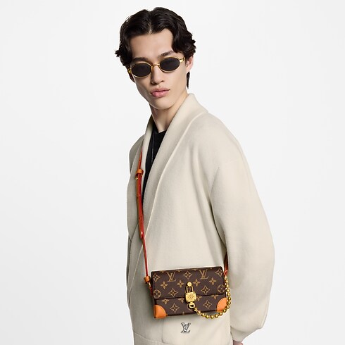 G69 Carteras y artículos de piel pequeños Bolsas pequeñas Cartera Steamer con cadena | Louis Vuitton ® (Ampliar producto)