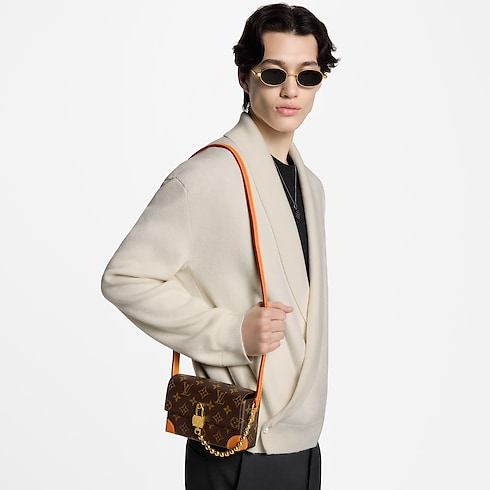 G69 Carteras y artículos de piel pequeños Bolsas pequeñas Cartera Steamer con cadena | Louis Vuitton ® (Ampliar producto)