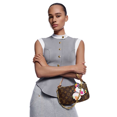 Monogram Carteras y artículos de piel pequeños Carteras con cadena y Micro Bolsas LV x TM bolsa Pochette Accessoires | Louis Vuitton ® (Ampliar producto)