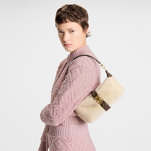 Carteras y artículos de piel pequeños Carteras con cadena y Micro Bolsas Pochette Mia | Louis Vuitton ® (Ampliar producto)